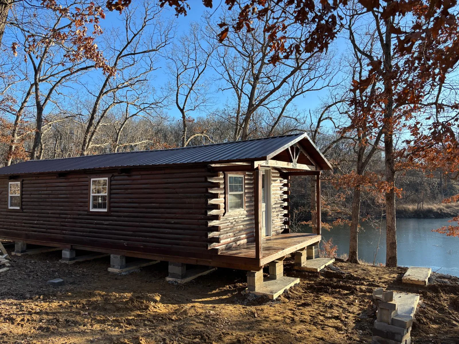 Cabin positioned near a river