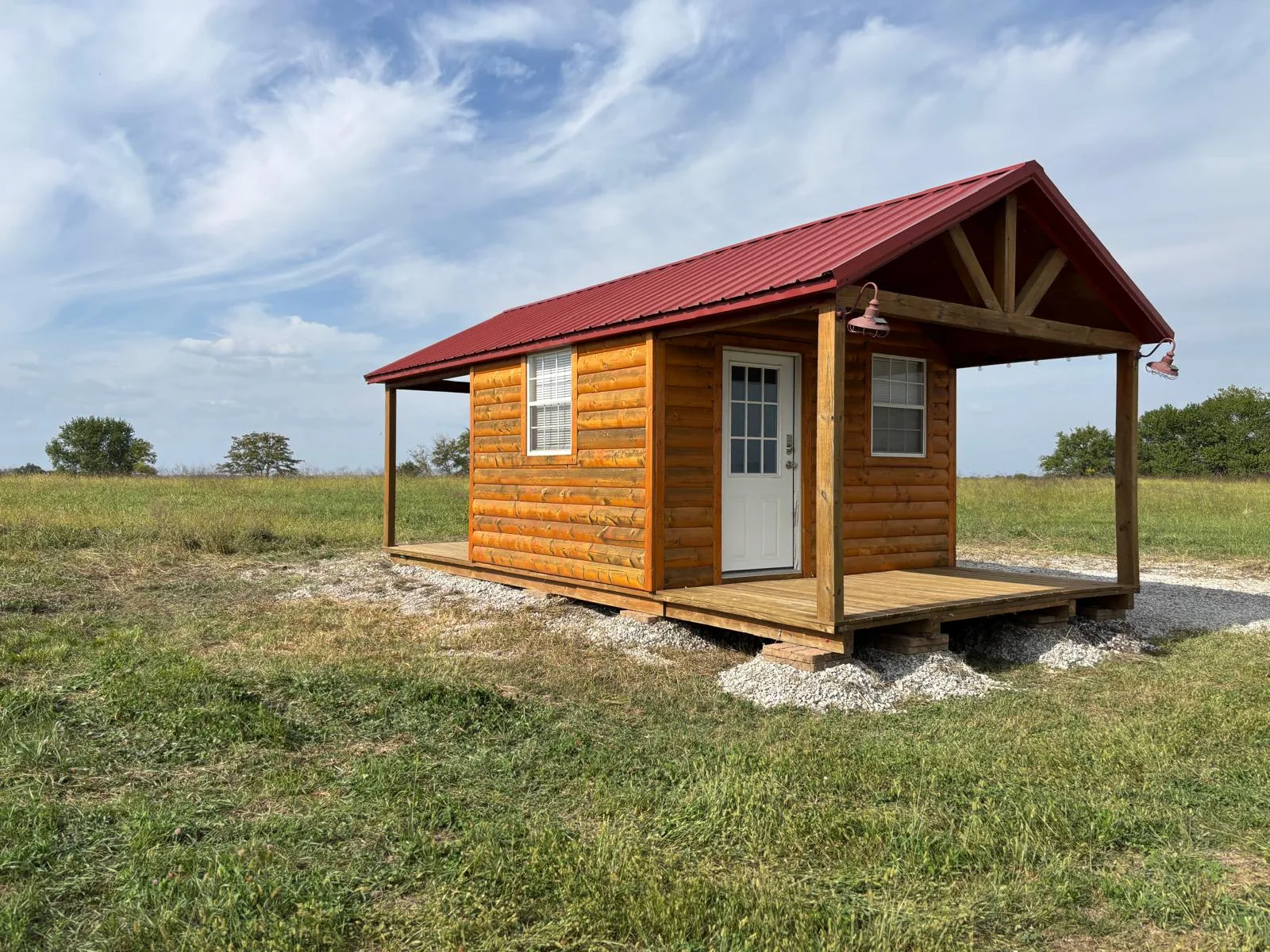 Portable log cabin prepared for placement